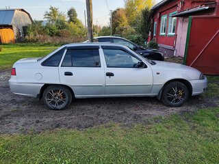 2011 Daewoo Nexia I Рестайлинг, серебристый, 299000 рублей, вид 3