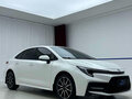 2023 Toyota Levin XII (E210) Рестайлинг, белый - вид 2