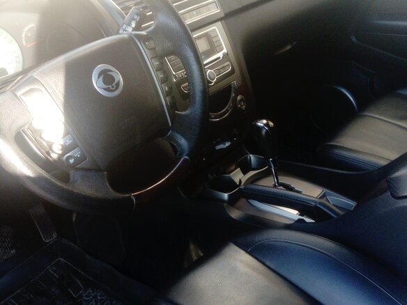 2013 SsangYong Rexton III, чёрный - вид 3