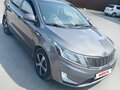 2011 Kia Rio III, серый, 850000 рублей