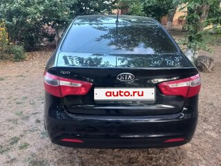2012 Kia Rio 5-speed III, чёрный, 820000 рублей, вид 5