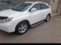 2011 Lexus RX 270 III, белый, 2600000 рублей - вид 1