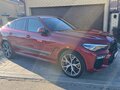 2020 BMW X6 30d III (G06), красный, 8009009 рублей - вид 2