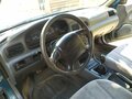 1999 Kia Clarus II, зелёный, 104437 рублей - вид 7