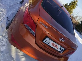 2014 Hyundai Solaris I Рестайлинг, оранжевый, 841999 рублей, вид 4