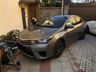 2013 Toyota Corolla XI (E160, E170, E180), золотистый, 1200000 рублей, вид 2