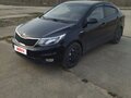 2015 Kia Rio 6-speed III, чёрный, 890000 рублей