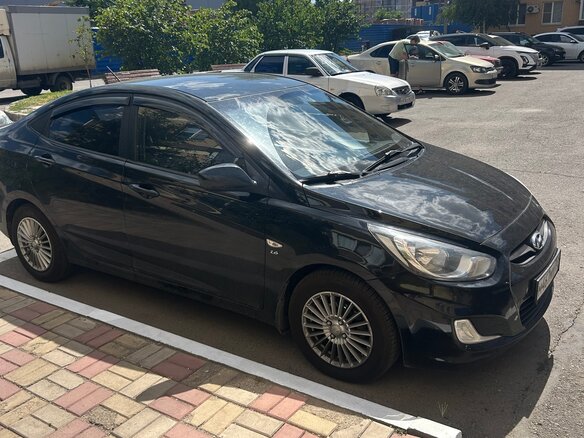 2011 Hyundai Solaris I, чёрный, 810000 рублей - вид 1
