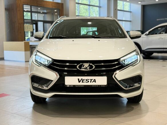 2026 Lada (ВАЗ) Vesta SW I Рестайлинг (NG), белый, 1860000 рублей - вид 1