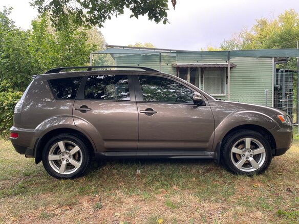 2012 Mitsubishi Outlander II Рестайлинг, коричневый, 1390000 рублей - вид 5