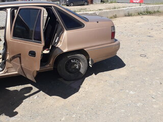 2001 Daewoo Nexia I, бежевый, 60000 рублей, вид 5