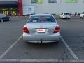 2010 Toyota Corolla Axio X (E140, E150) Рестайлинг, серый, 750000 рублей - вид 1