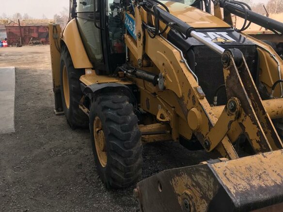 2012 Caterpillar 428F2 - вид 1