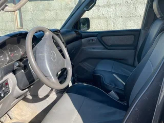 2003 Toyota Land Cruiser 105 100 Series Рестайлинг 1, чёрный, 1000000 рублей, вид 5