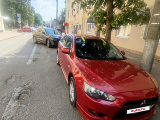 2007 Mitsubishi Lancer X, красный, 680000 рублей, вид 5