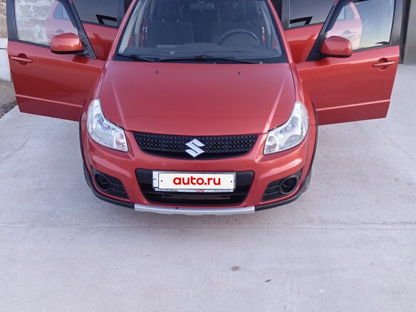 2011 Suzuki SX4 I (Classic) Рестайлинг, оранжевый, 750000 рублей - вид 2