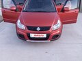 2011 Suzuki SX4 I (Classic) Рестайлинг, оранжевый, 750000 рублей - вид 2