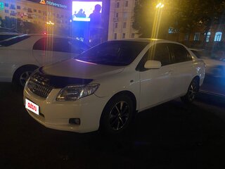 2008 Toyota Corolla Axio X (E140, E150), белый, 645000 рублей, вид 1