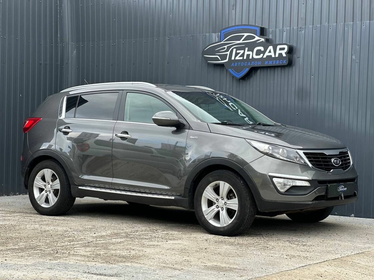 Открыть фотографии: Kia Sportage III