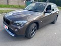 2011 BMW X1 18i I (E84), коричневый