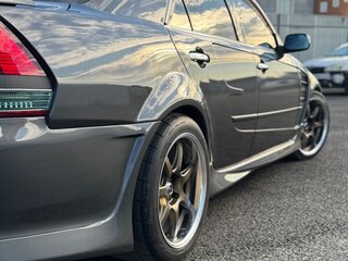2002 Toyota Mark II IX (X110), серый, 5500000 рублей, вид 3
