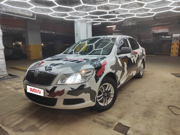 2011 Skoda Octavia II (A5) Рестайлинг, белый