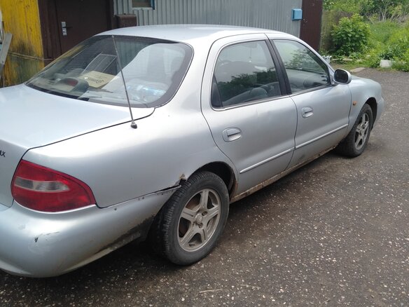 2000 Kia Clarus II, серый - вид 2