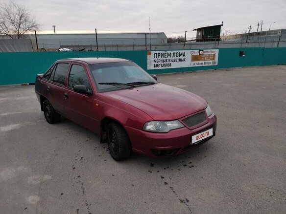 2009 Daewoo Nexia I Рестайлинг, красный - вид 1