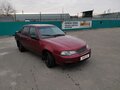 2009 Daewoo Nexia I Рестайлинг, красный - вид 1