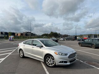 2016 Ford Fusion (North America) II, серебристый, 1200000 рублей, вид 1