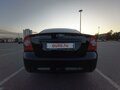 2010 Ford Focus II Рестайлинг, чёрный, 680000 рублей - вид 2