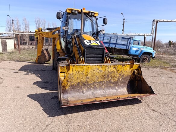 2008 Caterpillar 428, жёлтый, 5500000 рублей - вид 8