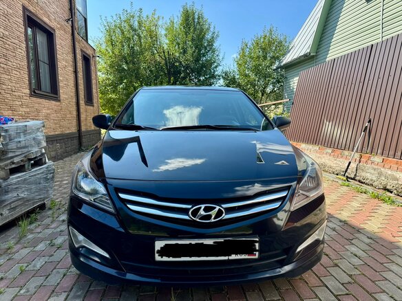 2015 Hyundai Solaris I Рестайлинг, чёрный - вид 1