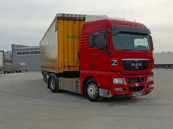 2011 MAN TGX, пурпурный, 6100000 рублей - вид 1