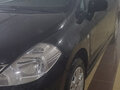 2010 Nissan Tiida I Рестайлинг, чёрный, 758000 рублей - вид 1