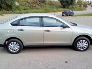 2015 Nissan Almera III (G15), серый, 749000 рублей, вид 4
