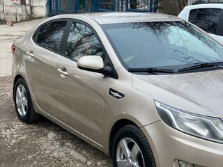 2012 Kia Rio 4-speed III, бежевый, 930000 рублей, вид 1