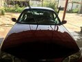 1996 Ford Escort (North America) III, красный - вид 2