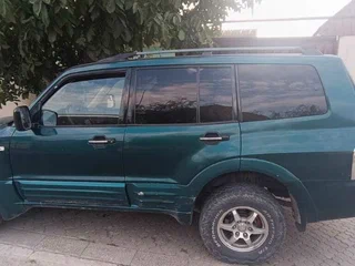 2001 Mitsubishi Montero III, зелёный, 900000 рублей, вид 4
