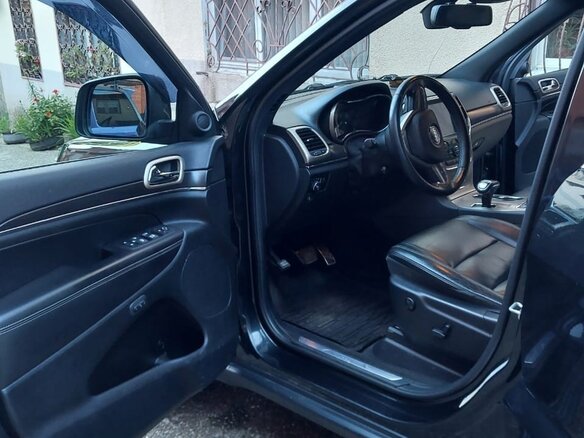 2013 Jeep Grand Cherokee IV (WK2) Рестайлинг, чёрный - вид 4