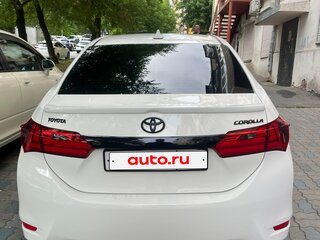 2014 Toyota Corolla XI (E160, E170, E180), белый, 1000000 рублей, вид 4