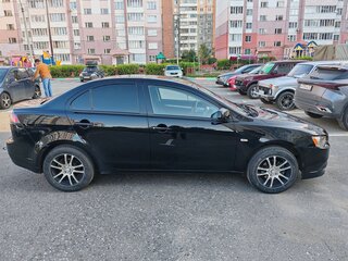 2010 Mitsubishi Lancer X, чёрный, 620000 рублей, вид 2