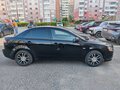 2010 Mitsubishi Lancer X, чёрный, 620000 рублей - вид 1