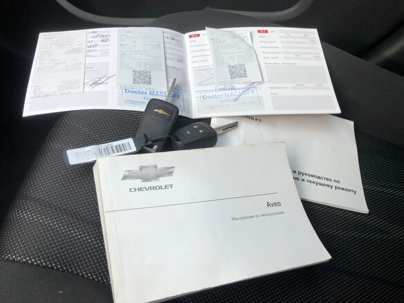 2015 Chevrolet Aveo II, серебристый - вид 19