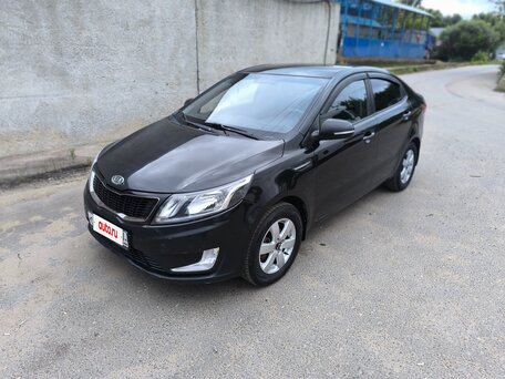 2012 Kia Rio 4-speed III, чёрный, 800000 рублей, вид 1