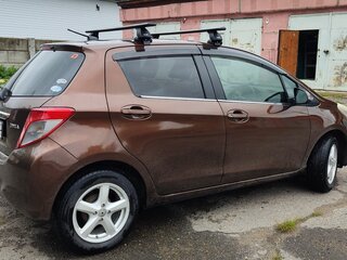 2011 Toyota Vitz III (XP130), коричневый, 750000 рублей, вид 4