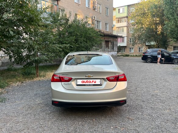 2016 Chevrolet Malibu IX, жёлтый, 1440000 рублей - вид 4