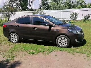 2014 Kia Rio 6-speed III, коричневый, 950000 рублей, вид 5