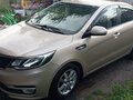2015 Kia Rio III Рестайлинг, бежевый, 1220000 рублей