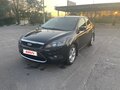 2011 Ford Focus II Рестайлинг, чёрный, 655000 рублей - вид 2